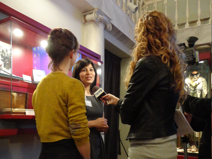 Greek-partner-Iro-Pappa-being-interviewed-for-tv Greek-partner-Iro-Pappa-being-interviewed-for-tv
